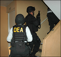 DEA arrest team executes arrest warrant