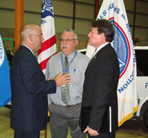 Caption: PRPD Superintendent Jose Figueroa, Javier F. Peña, DEA Special Agent in Charge, and Roberto Escobar, ICE Deputy Special Agent in Charge discuss future joint interdiction operations.