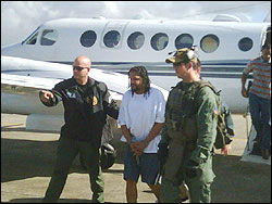 DEA Special Agents and FBI SWAT brought Alexis Candelaria-Santana via DEA aircraft to PR upon his extradition from St. Thomas, VI.