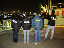 DEA, ICE and PRPD agents get ready to unload the 1.5 metric tons of cocaine from the “Two Brothers”