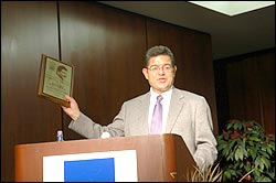 United States District Judge Ruben Castillo recieves the Raleigh J. Lopez Lifetime Achievement Award