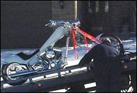 American Ironhorse Texas Chopper Motorcycle is loaded onto tow truck after being seized by DEA from alleged crack cocaine organization.