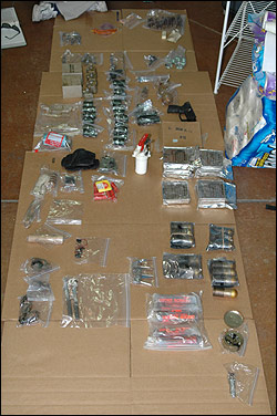 Weapons and drugs seized.