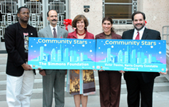 Ray Andrews, Director of Houston Crackdown-Office of the Mayor, Associate Special Agent in Charge Joe Arabit, and Lee Vela, Director of Public Relations with Clear Channel Outdoor recognize the Community Stars