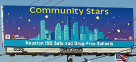 Houston Independent School District Safe and Drug-Free Schools billboard displayed throughout.