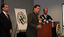 photo - Left to right: U.S. Attorney R. Alexander Acosta, SAC Mark R. Trouville & a captain from the Homestead Police Dept.