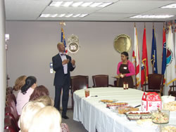 SAC Jimmy Fox addresses the women of the NOFD and introduces guest Christi Hamilton, a representative from the company, “Carol’s Daughter”.