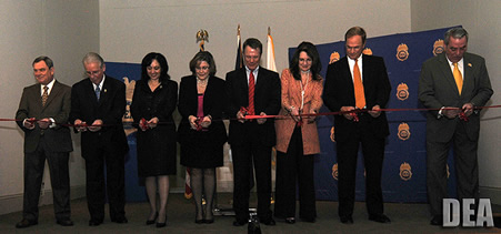 Ribbon Cutting Ceremony: from left to right : Joe Cook (General Manager FOX 8 WVUE), Bill Alden (President, DEA Educational Foundation), Michele M. Leonhart (Acting Administrator, Drug Enforcement Administration) Fran Harding (Director, Center for Substance Abuse Prevention), Dr Wilson Compton (Deputy Director, National Institute on Drug Abuse), Eileen Sweeney (Head of Motorola Foundation), Jim Mears (VP of Motorola), Jim Bernazzani (President, The Youth Rescue Initiative)