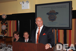 Associate Special Agent in Charge Nicholas Caruso addressing the audience.