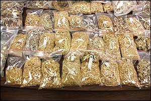 Gold, silver and jewels forfeited in international money laundering case.