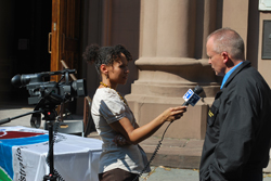 NY 1 interviewing SAC Gilbride at Old St. Patricks Church in Little Italy during the San Genaro Festival