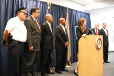 L-R Commissioner Ramsey, Deputy Mayor for Administration Richard Negrin, Deputy Mayor for Public Safety Everett Gillison, Philadelphia Mayor Michael Nutter, AUSA Catherine Stark (obstructed) SAC John J Bryfonski, Acting FBI SAC George Garcia and Acting United States Attorney Virginia Gibson (at podium).