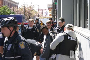 DEA Agents and Seattle Police Officers arrest a crack dealer near the famed Pikes Place Market in downtown Seattle.