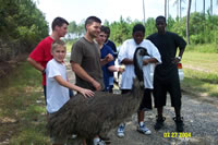 James Baggs ,son of ASAC Robert J. Baggs, petting Emu 
