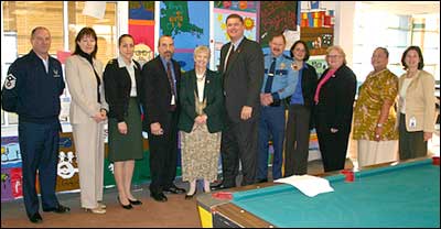 Alaska Red Ribbon Coalition from Left to Right - Sgt William Hall - Alaska National Guard, Noami Sweetman – DARE, Maj. Jane Lowery - Alaska National Guard, DEA ASAC Harvey Goehring, Carol Comeau - Superintendent Anchorage School Disrict, Timothy M. Burgess - US Attorney / District of Alaska, Capt Edward Harrington - Alaska State Troopers, Natasha Manion - Boys and Girls Club of Alaska, Ruth Schoenleben - NineStar Enterprises, Lucy Hansen - Polynesian Association of Alaska, Noelle Hardt - Boys and Girls Club of Alaska