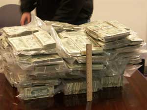 Photo showing some of the more than 5 million dollars in currency seized during this