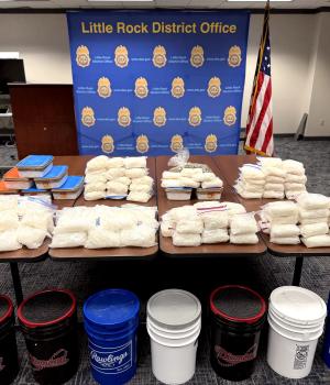 a table displays a variety of illegal narcotics