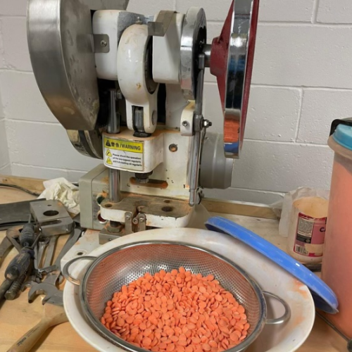 The suspected narcotics and pill presses.