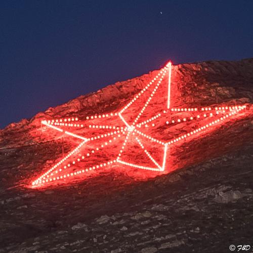Franklin Mountain Red Star in El Paso lit up in red for Red Ribbon Week