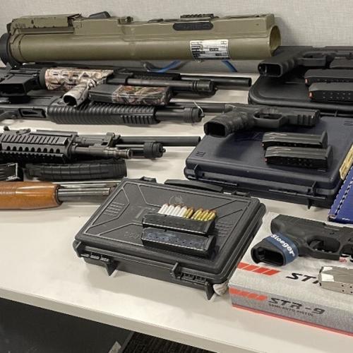 Firearms and ammunition recovered by the investigation.