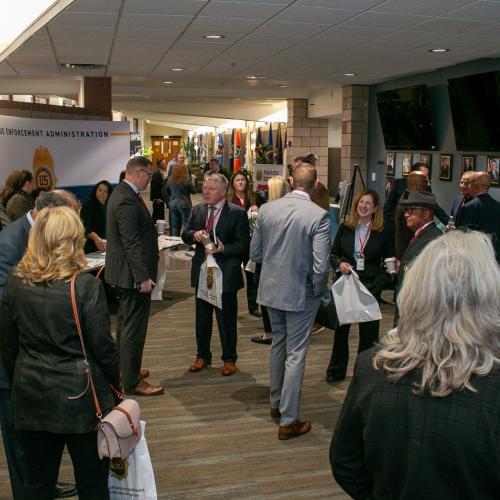 Various representatives from local and state law enforcement agencies meet and greet members of DEA