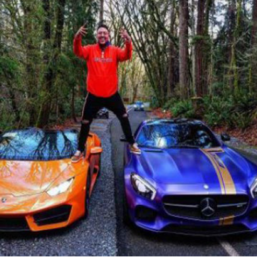 Valencia Rosas with expensive cars.