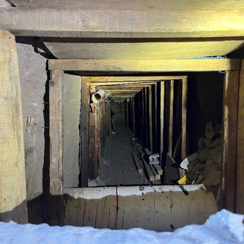 Photo of man-made tunnel used to smuggle aliens from Mexico to the United States.