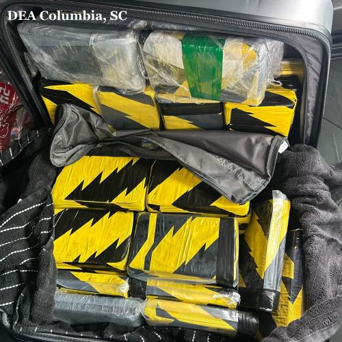 On July 1, DEA agents, Lexington County Sheriff’s deputies, and South Carolina State Transport Police officers conducted two coordinated traffic stops in Lexington and Richland counties. Inside a tractor trailer that was transporting products with a legitimate business purpose, law enforcement also found large packages of illegal narcotics. Investigators believe the seized narcotics were sourced in Mexico and transported across the southern border.