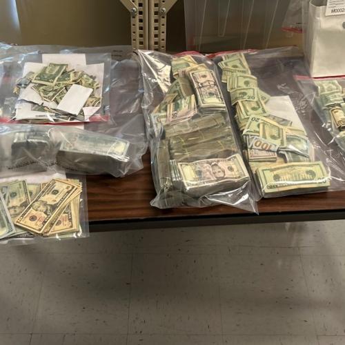Cash seized during October 16, 2025 enforcement action.