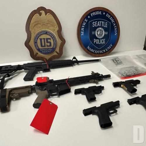 Firearms and cash seized on October 28, 2025.