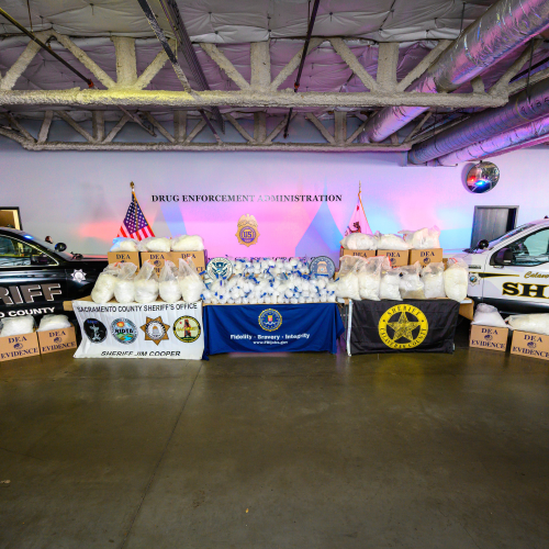 Sacramento County Sheriff’s Office and Calaveras County Sheriff’s Office vehicles staged with historic seizure