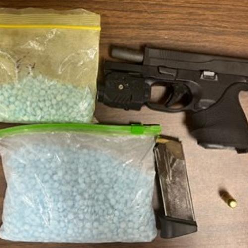 Seized fentanyl pills and firearm