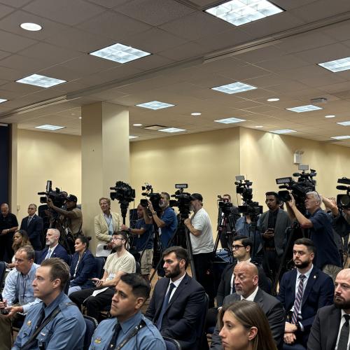 Members of the New York press at the press conference at the NYPD Lab in Queens, NY