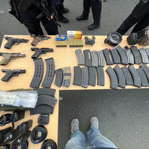 seizure of rifles, handguns, vehicles, a small aircraft, ammunition, ballistic vests, communication devices, cocaine, synthetic drugs, and U.S. currency.