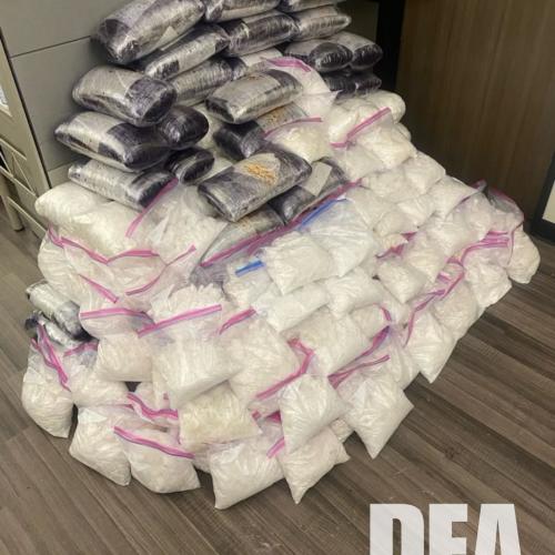 large pile of bags of seized drugs