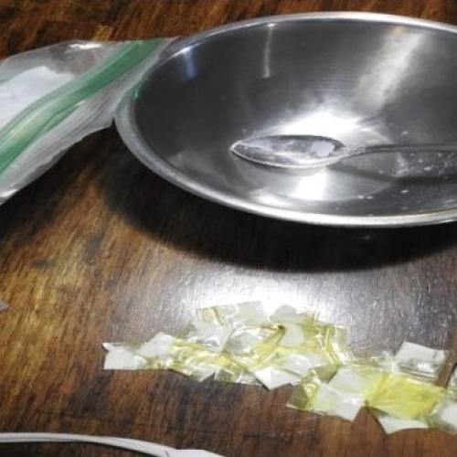More than 360 grams of fentanyl being packaged at one of the trafficker's stash houses.