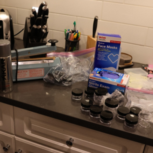 Station Containing Heat-Sealer, Plastic Baggies and Nitrile Gloves