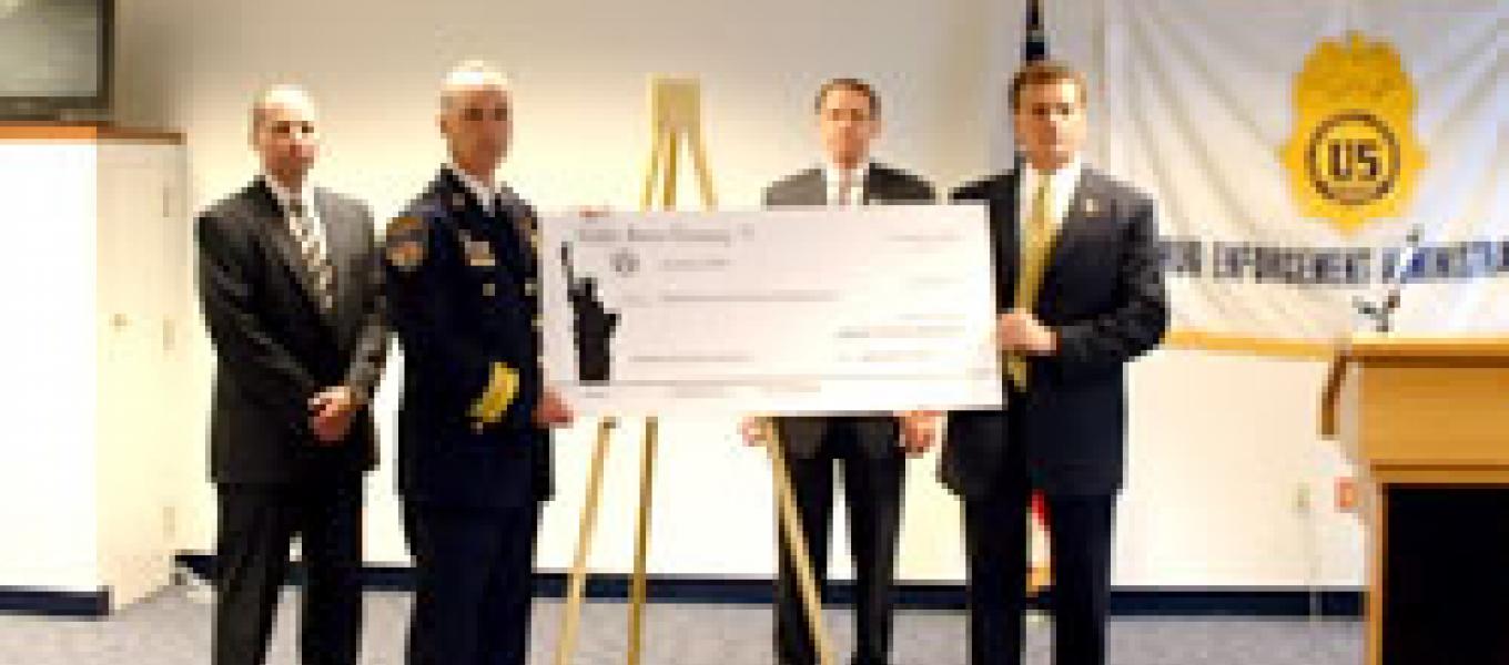 	L to R : Deputy Chief Monardo, Superintendent Sheridan Commissioner Bealefeld, ASAC Kotowski and USA Rosenstein L to R: Deputy Chief Monardo, Commissioner Bealefeld, USA Rosenstein and ASAC Kotowski