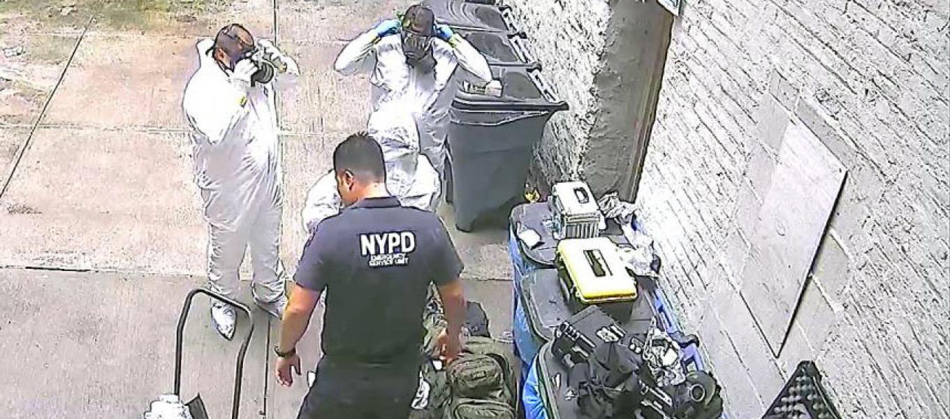NYPD Emergency Service Unit-Weapons of Mass Destruction preparing to dismantle the pill press operation 