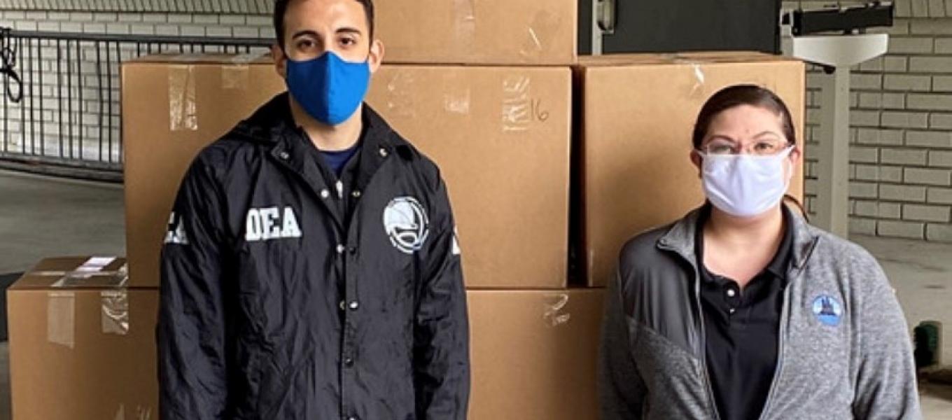 DEA and Mercer Island Police with 9 boxes of collected prescription drugs