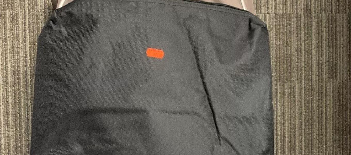 Black rolling suitcase used to transport 13 kilograms of fentanyl