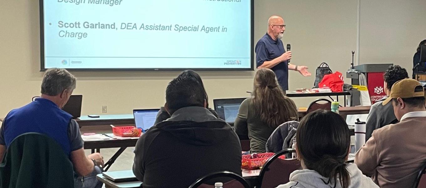 Albuquerque District Office ASAC Garland welcomes APS educators to the training.