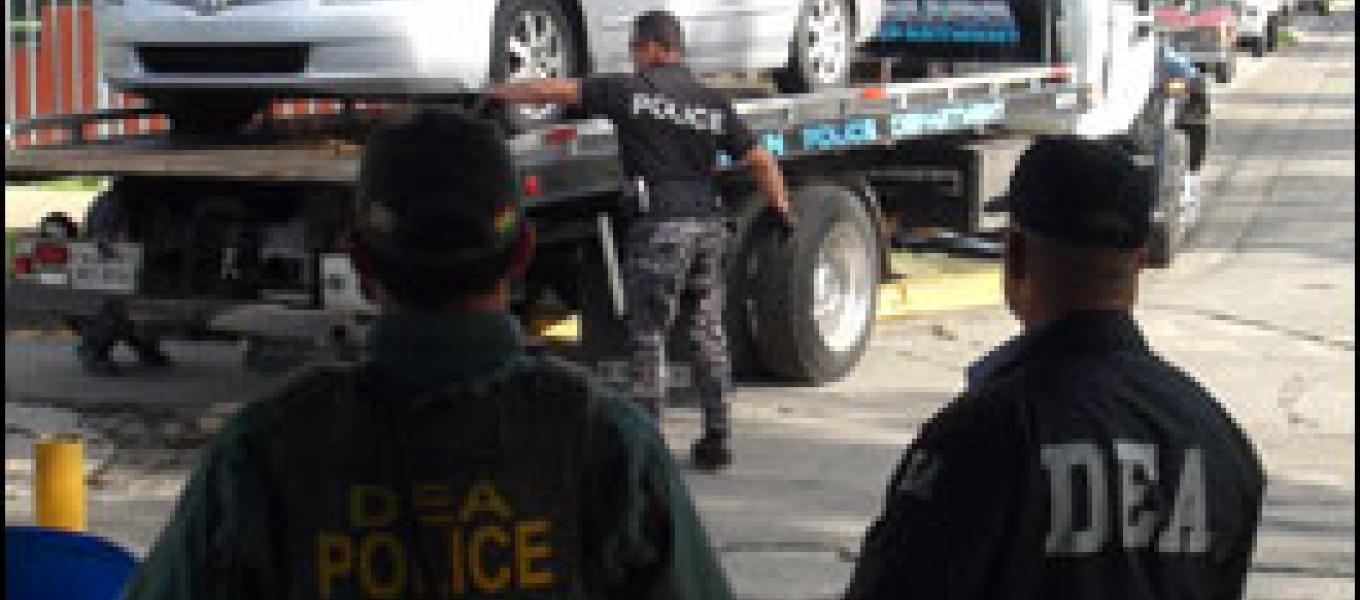 DEA, ATF and PRPD agents seize a vehicle as part of the arrest operation conducted at the Manuel A. Perez Public Housing Project in San Juan, P.R. 