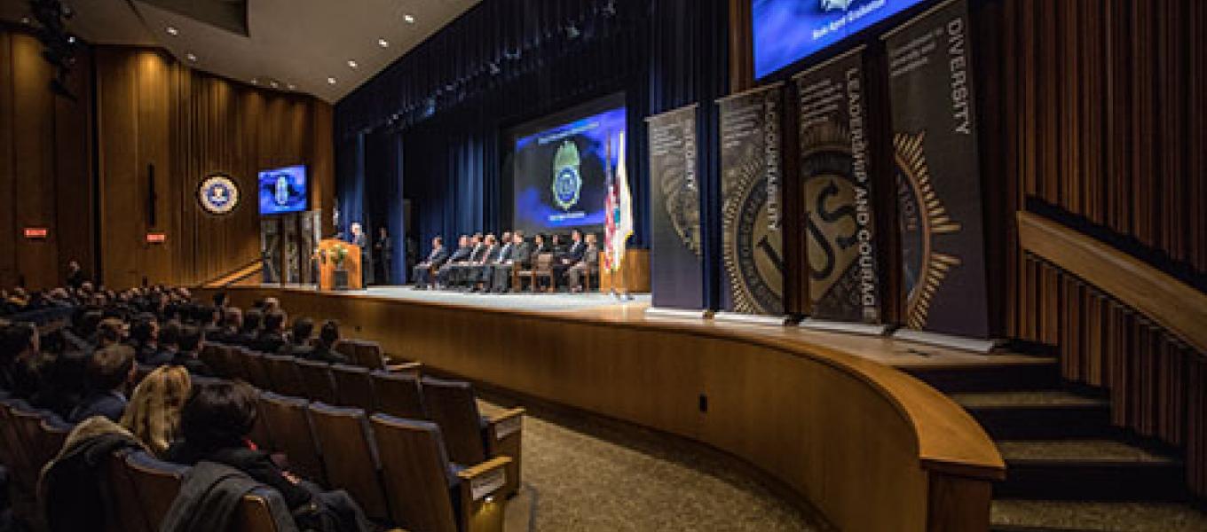 Attorney General Sessions addresses the newly commissioned Special Agent graduates, their family and friends as they complete Basic Agent training at Quantico, Va. on Friday.
