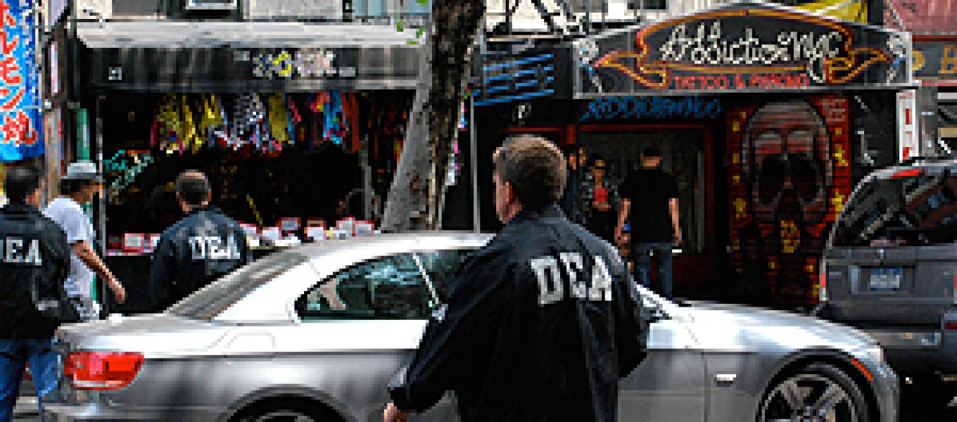 DEA Agent outside one of the shops allegedly selling “bath salts.”