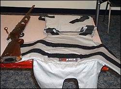 Bulletproof vest and rifle