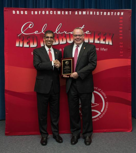 Office of National Drug Control Policy (ONDCP) Deputy Director Jim Carroll and Acting Administrator Dhillon .