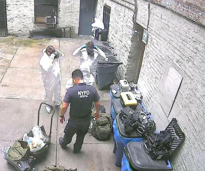NYPD Emergency Service Unit-Weapons of Mass Destruction preparing to dismantle the pill press operation 