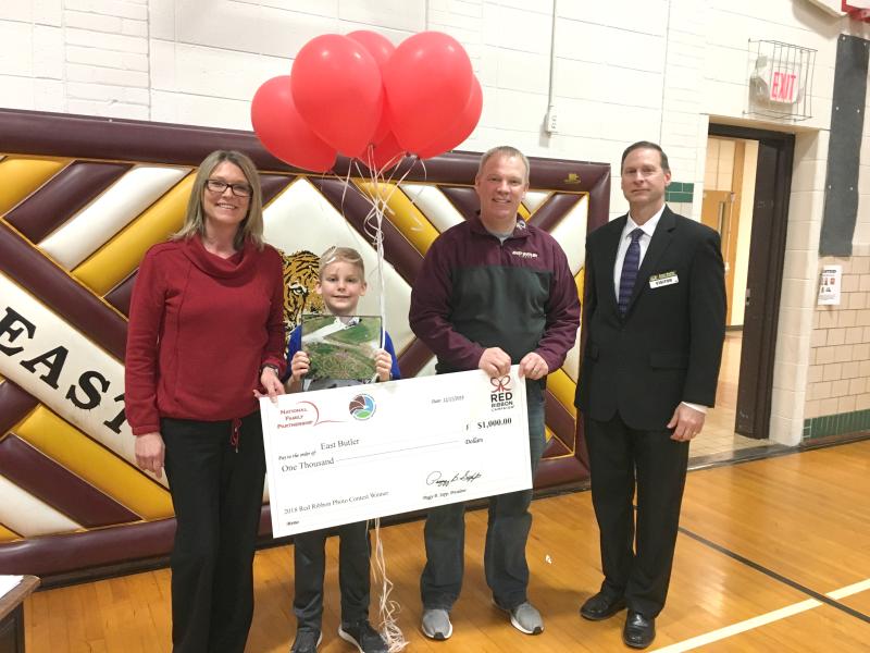 DEA Omaha Division Diversion Outreach Coordinator Erin Payne, Award Winner Chance Rohda, East Butler Public School Principal Shawn Biltoft and Diversion Program Manager William Stockmann.