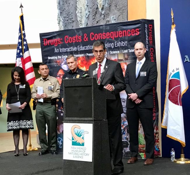 AA Dhillon and law enforcement at the podium